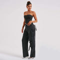 Completo da donna con top e pantaloni jeans
