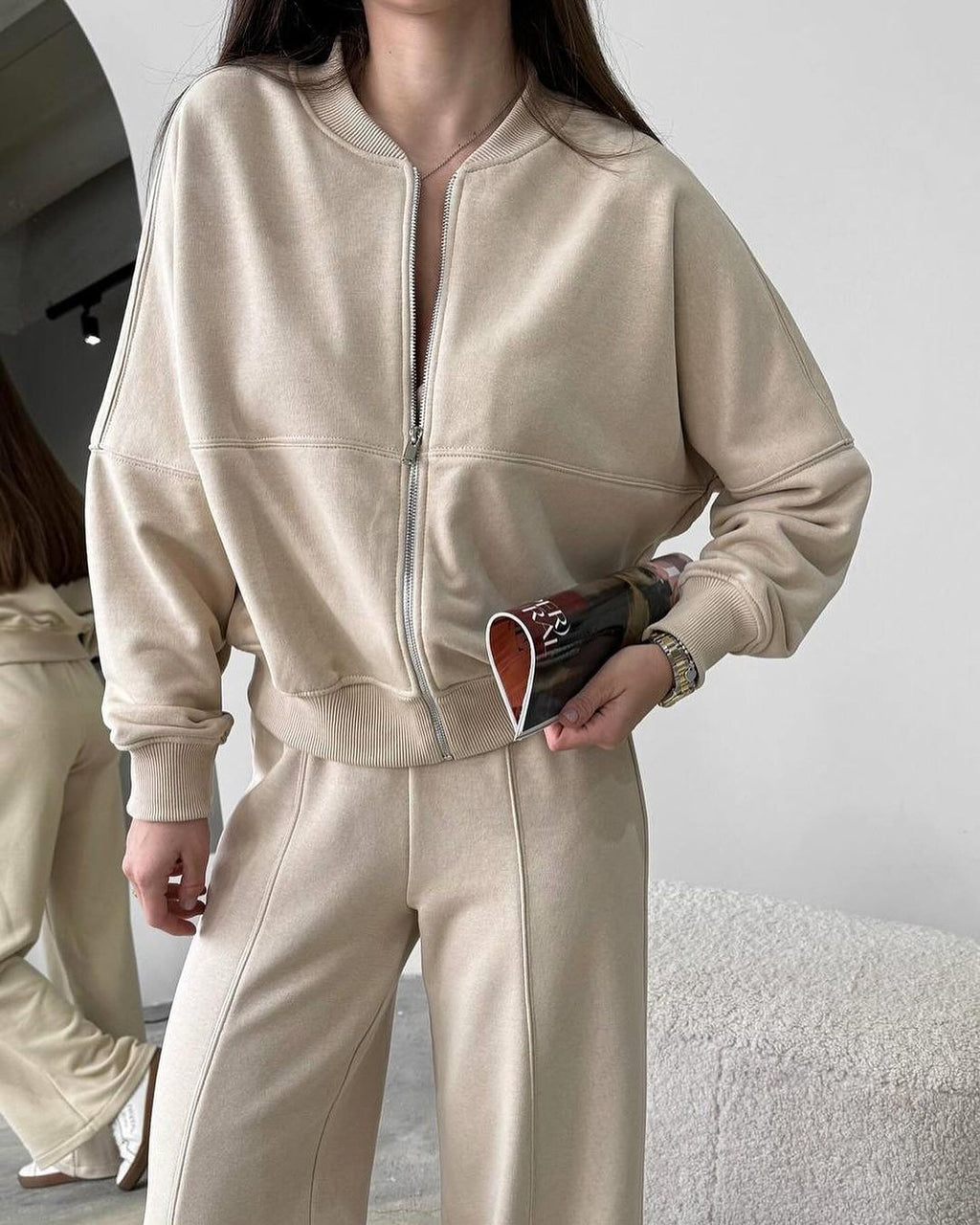 Tuta con cardigan con cerniera