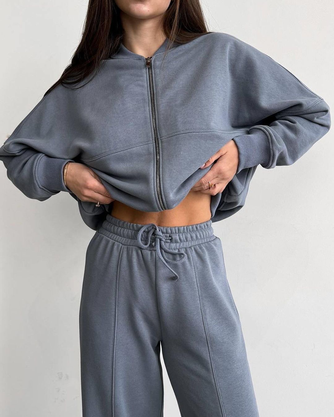 Tuta con cardigan con cerniera